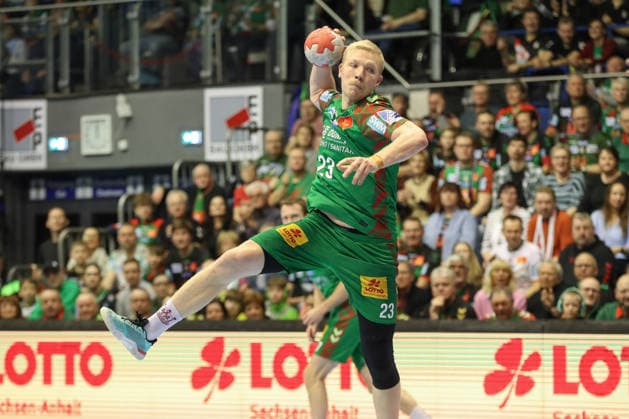 22 02 2026, xgox, Handball Daikin HBL SC Magdeburg GWD Minden emspor, v l Magnus Saugstrup Magdeburg, 23 throws goal, Torschuetze, scores goal, Treffer, scores the goal Magdeburg