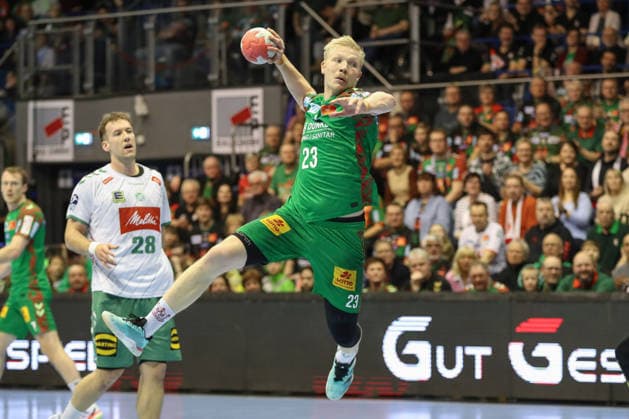 22 02 2026, xgox, Handball Daikin HBL SC Magdeburg GWD Minden emspor, v l Magnus Saugstrup Magdeburg, 23 throws goal, Torschuetze, scores goal, Treffer, scores the goal Magdeburg