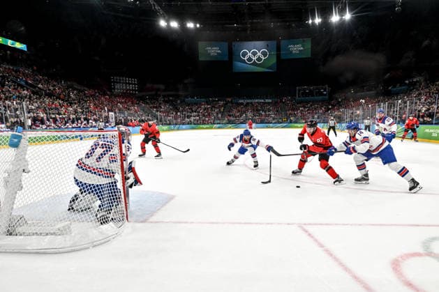 MILAN, ITALY - FEBRUARY 22: Connor McDavid of Canada R) in action against Brock Faber of United States R) and Vincent Trocheck of United States during the Ice hockey, Eishockey Men™s Gold Medal Game match between Canada and USA on day sixteen of the Milano Cortina 2026 Winter Olympic Games, Olympische Spiele, Olympia, OS at Milano Santagiulia Ice Hockey Arena on February 22, 2026 in Milan, Italy. Milan Milano Santagiulia Ice Hockey Arena Italy *** MILAN, ITALY FEBRUARY 22 Connor McDavid of Canada R in action against Brock Faber of United States R and Vincent Trocheck of United States during the Ice Hockey Men™s Gold Medal Game match between Canada and USA on day sixteen of the Milano Cortina 2026 Winter Olympic games at Milano Santagiulia Ice Hockey Arena on February 22, 2026 in Milan, Italy Milan Milano Santagiulia Ice Hockey Arena Italy Copyright: xJustPictures.ch AndreaxBrancax jp-en-EuSpIm-AB-DSC_454722022026