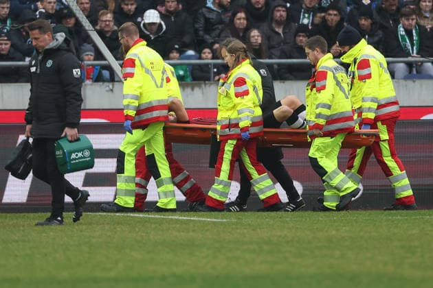 2 Bundesliga Hannover 96 Dynamo Dresden on 22 02 2026 at Heinz von Heiden Arena in Hannover Boris Tomiak Hannover is carried off the pitch MH