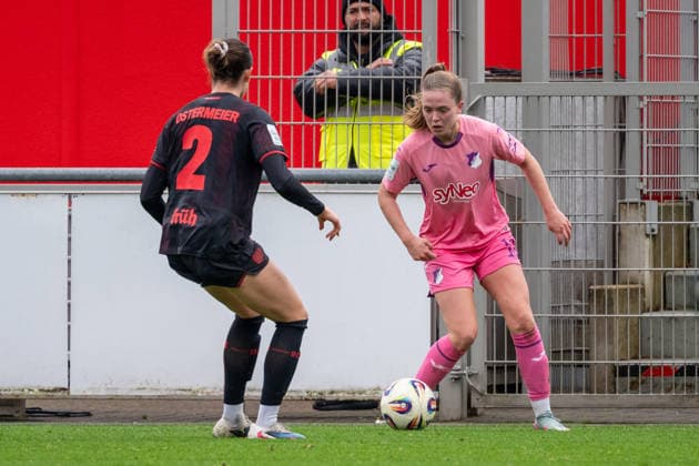 Duel between Selina Ostermeier Bayer 04 Leverkusen, 02 and Valesca Ampoorter TSG Hoffenheim, 18 Bayer 04 Leverkusen vs TSG 1899 Hoffenheim, Football, Womens Bundesliga, Matchday 19, Season 2025 2026, 22 02 2026 DFL DFB Regulations prohibit any use of Photographs as image sequences and or Quasivideo Bayer 04 Leverkusen vs TSG 1899 Hoffenheim , Football, Womens Bundesliga, Matchday 19, Season 2025 2026, 22 02 2026 Leverkusen Copyright: xEibner-Pressefoto ThomasxHaeslerx EP_THR
