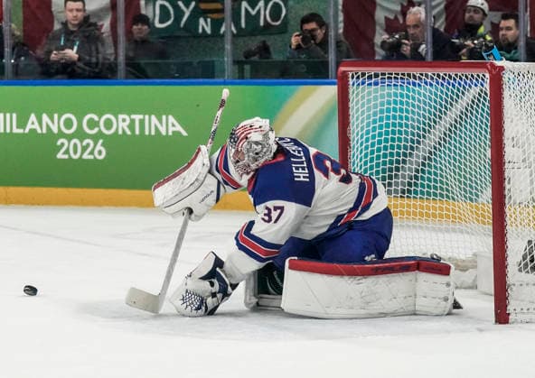 United States Connor Hellebuyck (37) defends the goal in the second period of the Men s Hockey Gold Medal game between the USA and Canada at the Milano Santagiulia Ice hockey, Eishockey Arena in Milan, Italy, on Sunday, February 22, 2026.  OLY20260222317 RICHARDxELLIS