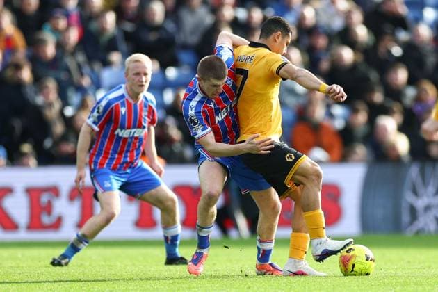 Adam Wharton of Crystal Palace grapples with Andre of Wolverhampton Wanderers Crystal Palace v Wolverhampton Wanderers, Premier League, Football, Selhurst Park, London, UK - 22 Feb 2026London Selhurst Park United Kingdom EDITORIAL USE ONLY No use with unauthorised audio, video, data, fixture lists, club league logos or live services. Online in-match use limited to 120 images, no video emulation. No use in betting, games or single club league player publications. Copyright: xSimonxDael Shutterstockx 16681548ar