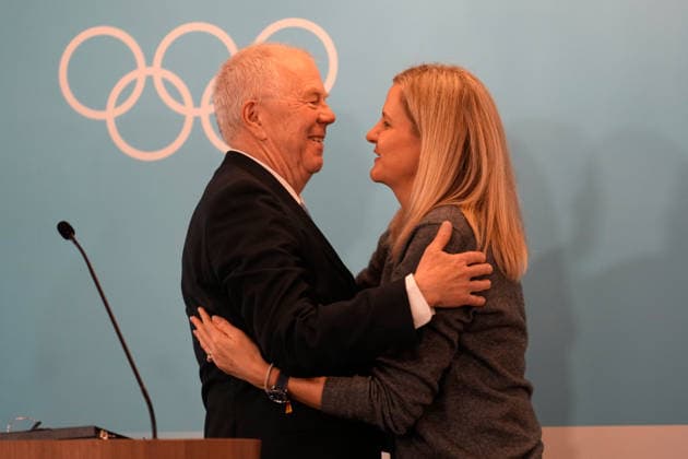 (260222) -- MILAN, Feb. 22, 2026 -- IOC President Kirsty Coventry (R) embraces Olle Dahlin, President of the International Biathlon Union, during an IOC session at the Milan-Cortina 2026 Olympic Winter games, Winterspiele,Spiele, Summer games in Milan, Italy, Feb. 22, 2026. ( Pool via Xinhua) (MICO2026)ITALY-MILAN-OLYMPIC WINTER GAMES-IOC SESSION LucaxBruno 