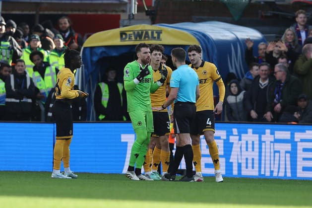 22nd February 2026; Selhurst Park, Selhurst, London, England; Premier League Football, Crystal Palace versus Wolverhampton Wanderers; Wolverhampton Wanderers players confront referee Thomas Kirk over his decision to show Ladislav Krejci a red card following a second yellow card  KatiexChan Content restricted for UK based newspaper