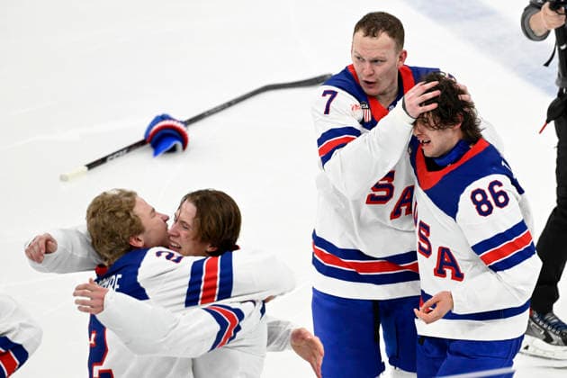 LKS 20260222 Players of USA celebrating 1-2 overtime victory during the men s Ice hockey, Eishockey gold medal match between Canada and USA during the Milano Cortina Winter Olympics at the Milano Santagiulia Ice Hockey Arena in Milan on February 22, 2026. On the right is Jack Hughes who scored the winning goal. - EMMI KORHONEN Milano Italy 1pzqmbeg9mc  Copyright: xEmmixKorhonenx 1pzqmbeg9mc