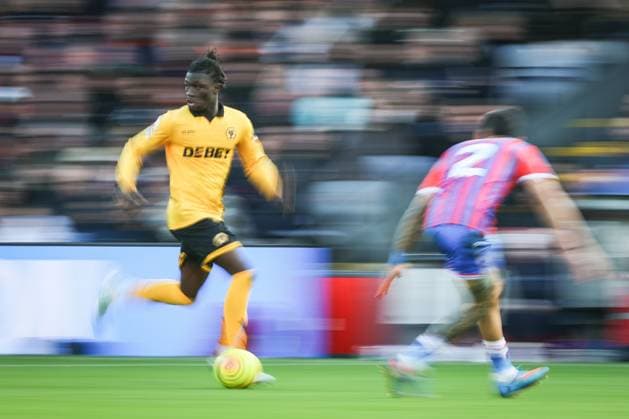 Mateus Mane of Wolverhampton Wanderers takes on Daniel Munoz of Crystal Palace Crystal Palace v Wolverhampton Wanderers, Premier League, Football, Selhurst Park, London, UK - 22 Feb 2026London Selhurst Park United Kingdom EDITORIAL USE ONLY No use with unauthorised audio, video, data, fixture lists, club league logos or live services. Online in-match use limited to 120 images, no video emulation. No use in betting, games or single club league player publications.  Copyright: xSimonxDael Shutterstockx 16681548be
