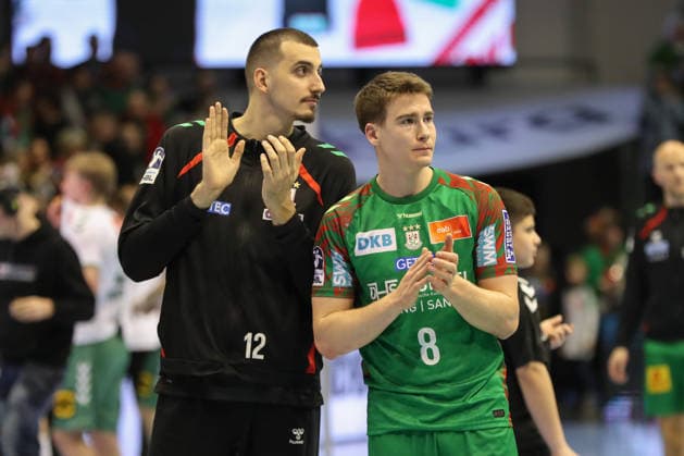 22 02 2026, xgox, Handball Daikin HBL SC Magdeburg GWD Minden emspor, f l Matej Mandic Magdeburg, 12 , Manuel Zehnder Magdeburg, 8 Celebrating the victory, cheering after the end of the game Magdeburg