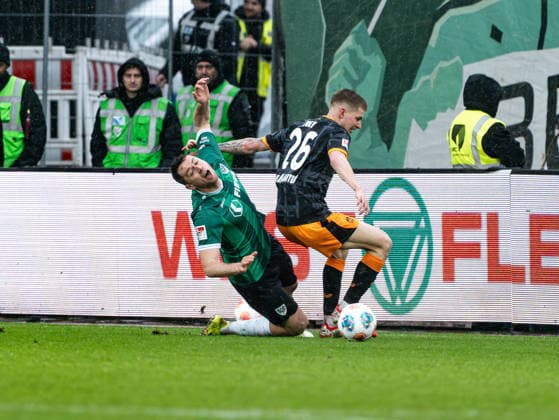 Paul Joly 1 FC Kaiserslautern, 26 in duel against Torge Paetow SC Preussen Muenster, 16 Preussen Muenster vs 1 FC Kaiserslautern, Soccer, 2 Bundesliga, Matchday 23, Season 2025 2026, 22 02 2026 DFL REGULATES PROHIBIT ANY USE OF PHOTOGRAPHS AS IMAGE SEQUENCES AND OR QUASI VIDEO, Preussen Muenster vs 1 FC Kaiserslautern, Football, 2 Bundesliga, Matchday 23, Season 2025 2026, 22 02 2026 Muenster Copyright: xEibner-Pressefoto DamianxKruczynx EP_DKI