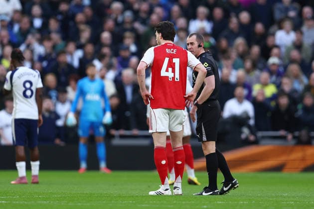 London, England, 22nd February 2026. Referee Peter Bankes talks with Declan Rice of Arsenal during a delay in play during the Tottenham Hotspur vs Arsenal Premier League match at the Tottenham Hotspur Stadium, London. Picture credit should read: Paul Terry Sportimage EDITORIAL USE ONLY. No use with unauthorised audio, video, data, fixture lists, club league logos or live services. Online in-match use limited to 120 images, no video emulation. No use in betting, games or single club league player publications. SPI_014_PT_Tottenham_Arsenal SPI-4545-0014