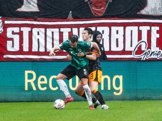 Yassine Bouchama SC Preussen Muenster, 05 in duel against Jisoo Kim 1 FC Kaiserslautern, 05 Preussen Muenster vs 1 FC Kaiserslautern, Soccer, 2 Bundesliga, Matchday 23, Season 2025 2026, 22 02 2026 DFL REGULATES PROHIBIT ANY USE OF PHOTOGRAPHS AS IMAGE SEQUENCES AND OR QUASI VIDEO, Preussen Muenster vs 1 FC Kaiserslautern, Football, 2 Bundesliga, Matchday 23, Season 2025 2026, 22 02 2026 Muenster Copyright: xEibner-Pressefoto DamianxKruczynx EP_DKI