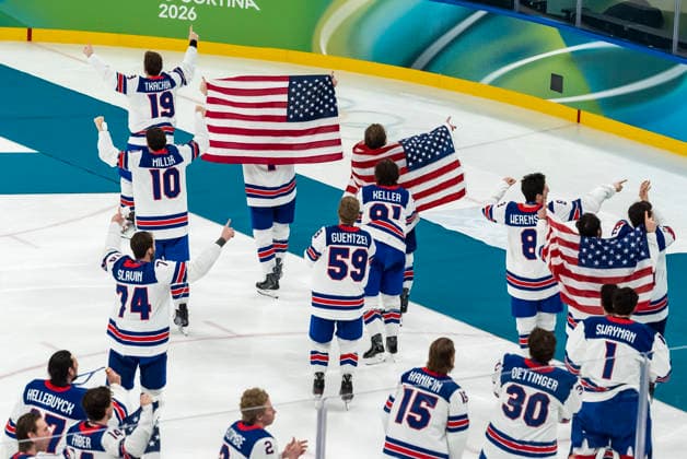 February 22, 2026, Milan, Lombardy, Italy: Team USA celebrates after defeating Team Canada 2:1 in overtime for the Mens Gold Medal Game at the Milano Santagiulia Ice hockey, Eishockey Arena in MILAN, Italy during the 2026 Milano Cortina Winter Olympics. Olympics 2026: Milano Cortina: Ice Hockey Mens: Gold Medal Game: USA 2:1 CAN  - ZUMAa161 20260222_oly_a161_026 Copyright: xWalterxG.xArcex
