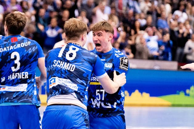 Cheering pictures TVB Stuttgart, after the victory, here Jakob Nigg, TVB Stuttgart, 57 , and Linus Schmid, TVB Stuttgart, 18 , TVB Stuttgart vs TSV Hannover Burgdorf, DAIKIN Handballbundesliga, 22 Matchday, Season 2025 2026, 22 02 2026 Eibner Pressefoto Andreas Ulmer TVB Stuttgart vs TSV Hannover Burgdorf, DAIKIN Handballbundesliga, 22 Matchday, Season 2025 2026, 22 02 2026 Stuttgart Copyright: xEibner-Pressefoto AndreasxUlmerx EP_AUR