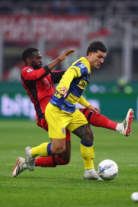 Fikayo Tomori (Ac Milan) battle for the ball, Serie A, AC Milan v Parma Calcio 1913, Giuseppe Meazza, February 22, 2026, Milan, Italy.