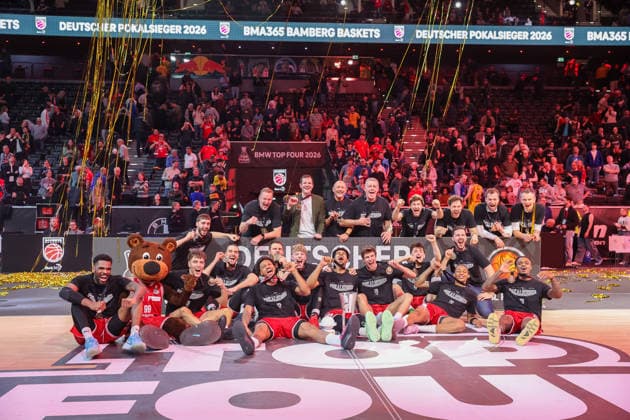 Bamberg Baskets players celebrate cup victory, Emotions, Joy, Winner, GER, BMA365 Bamberg Baskets vs Alba Berlin, Basketball, BBL Cup, BMW TOP FOUR, Final, Season 2025 2026, 22 02 2026, GER, BMA365 Bamberg Baskets vs Alba Berlin, Basketball, BBL Cup, BMW TOP FOUR, Final, Season 2025 2026, 22 02 2026 Muenchen Copyright: xEibner-Pressefoto JennixMaulx EP_JML