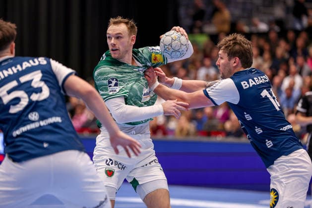 22 02 2026, Handball, HBL, Bergischer HC Füchse Berlin, Mitsubishi Electric HALLE Düsseldorf Mathias Gidsel Füchse Berlin 19 in duel against Soeren Steinhaus BHC 53 Gerdas Babarskas BHC 14 North Rhine-Westphalia Germany