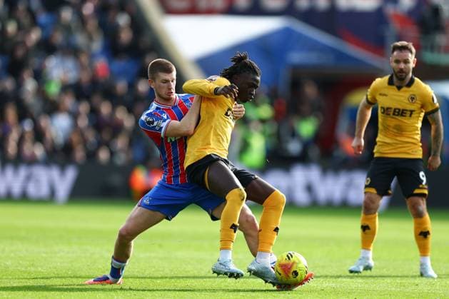 Mateus Mane of Wolverhampton Wanderers under pressure from Adam Wharton of Crystal Palace Crystal Palace v Wolverhampton Wanderers, Premier League, Football, Selhurst Park, London, UK - 22 Feb 2026London Selhurst Park United Kingdom EDITORIAL USE ONLY No use with unauthorised audio, video, data, fixture lists, club league logos or live services. Online in-match use limited to 120 images, no video emulation. No use in betting, games or single club league player publications. Copyright: xSimonxDael Shutterstockx 16681548co