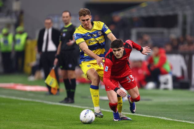 Mateo Pellegrino (Parma Calcio) und Davide Bartesaghi (Ac Milan) battle for the ball, Serie A, AC Milan v Parma Calcio 1913, Giuseppe Meazza, February 22, 2026, Milan, Italy.