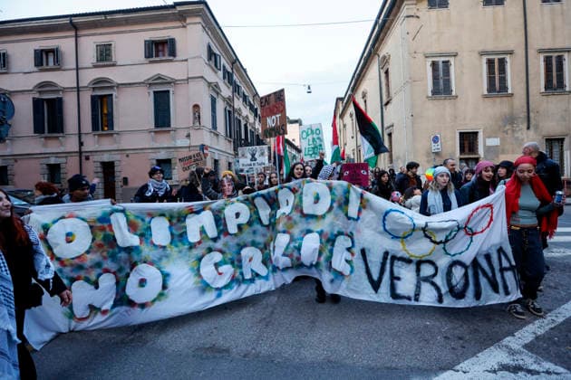 Protestors demonstrate before the Closing Ceremony of the Milano Cortina 2026 Olympic Games, Olympische Spiele, Olympia, OS outside the Verona Arena in Verona, Italy on Sunday, February 22, 2026. Norway won the most medals with a total of 41, with the United States following at 33.  ITA20260222800 AARONxJOSEFCZYK