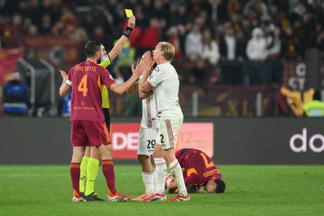 22nd February 2026, Stadio Olimpico, Rome, Italy; Serie A Football; Roma versus Cremonense; referee Marco Di Bello issues a yellow card to Morten Thorsby of US Cremonese  AllShotLive Content restricted for UK based newspaper
