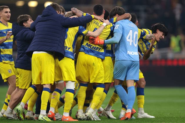 Milan, Italy, 22nd February 2026. Winning golascorer Mariano Troilo of Parma Calcio celebrates the 1-0 victory with the team mates following the final whistle of the AC Milan vs Parma Serie A match at Giuseppe Meazza, Milan. Picture credit should read: Jonathan Moscrop Sportimage EDITORIAL USE ONLY. No use with unauthorised audio, video, data, fixture lists, club league logos or live services. Online in-match use limited to 120 images, no video emulation. No use in betting, games or single club league player publications. SPI_051_MILAN_PARMA SPI-4549-0051