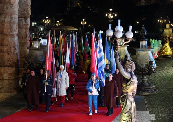 (260222) -- VERONA, Feb. 22, 2026 -- Flagbearers parade into the venue during the closing ceremony of the Milan-Cortina 2026 Olympic Winter games, Winterspiele,Spiele, Summer games at Verona Olympic Arena in Verona, Italy, Feb. 22, 2026. ) (MICO2026)ITALY-VERONA-OLYMPIC WINTER GAMES-CLOSING CEREMONY WangxKaiyan 