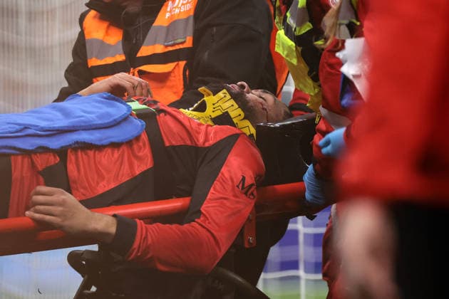 Milan, Italy, 22nd February 2026. Ruben Loftus-Cheek of AC Milan is taken away on a stretcher with blood running from his cheekbone following a clash with Edoardo Corvi of Parma Calcio during the AC Milan vs Parma Serie A match at Giuseppe Meazza, Milan. Picture credit should read: Jonathan Moscrop Sportimage EDITORIAL USE ONLY. No use with unauthorised audio, video, data, fixture lists, club league logos or live services. Online in-match use limited to 120 images, no video emulation. No use in betting, games or single club league player publications. SPI_065_MILAN_PARMA SPI-4549-0066