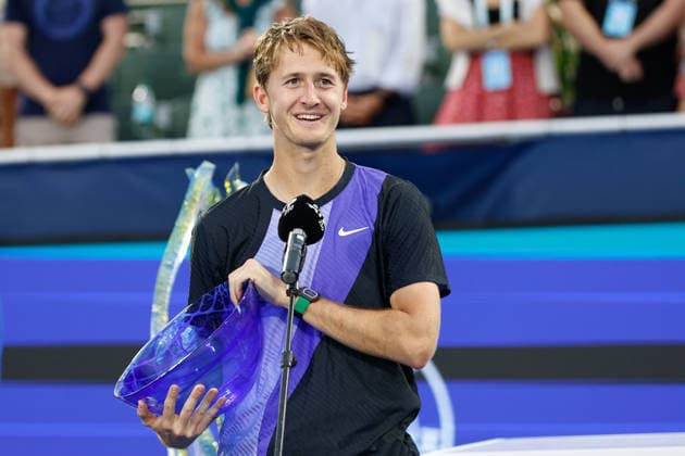DELRAY BEACH, FL - FEBRUARY 22: Sebastian Korda (USA) celebrates with his Delray Beach Open Winners Championship Trophy after his game with Tommy Paul (USA) at the Delray Beach Open on February 22, 2026, at Delray Beach Stadium & Tennis Center in Delray Beach, Florida.(Photo by Chris Arjoon Icon Sportswire). TENNIS: FEB 22 Delray Beach Open EDITORIAL USE ONLY Icon2602210010212