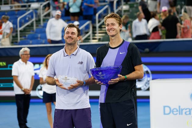 DELRAY BEACH, FL - FEBRUARY 22: Sebastian Korda (USA) and Tommy Paul (USA) celebrate with their Mens winners and runners up Delray Beach Open Championship Trophies at the Delray Beach Open on February 22, 2026, at Delray Beach Stadium & Tennis Center in Delray Beach, Florida.(Photo by Chris Arjoon Icon Sportswire). TENNIS: FEB 22 Delray Beach Open EDITORIAL USE ONLY Icon2602210010213