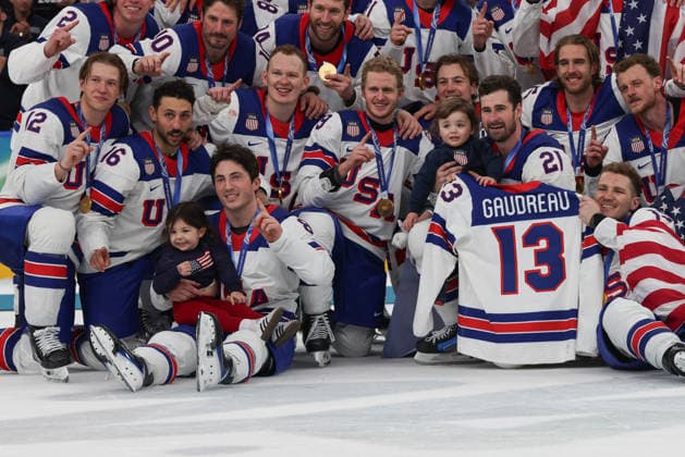 February 22, 2026: Team United States poses with the children of Johnny Gaudreau and his number 13 jersey after winning the Gold medal in the Mens Ice hockey, Eishockey Gold Medal game between Canada and USA held at Milano Santagiulia Ice Hockey Arena during the Milano Cortina 2026 Olympic Games, Olympische Spiele, Olympia, OS in Milan, Italy. MilanoCortina2026 Milan Italy - ZUMAc04_ 20260222_zma_c04_099 Copyright: xDanielxLeax