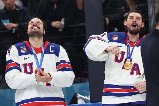 February 22, 2026: Auston Matthews (34) and Connor Hellebuyck (37) of the United States rejoice at the medal ceremony following the Mens Ice hockey, Eishockey Gold Medal game between Canada and USA held at Milano Santagiulia Ice Hockey Arena during the Milano Cortina 2026 Olympic Games, Olympische Spiele, Olympia, OS in Milan, Italy. MilanoCortina2026 Olympics Milano Cortina 2026: Gold Medal Game Mens Ice Hockey Canada Vs United States Feb 22  - ZUMAc04_ 20260222_zma_c04_100 Copyright: xDanielxLeax