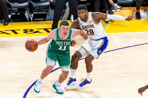 February 22, 2026, Los Angeles, California, USA: Boston CelticsÃ¢â‚¬â ¢ Payton Pritchard (11) drives past Los Angeles LakersÃ¢â‚¬â ¢ Rui Hachimura (28) during an NBA, Basketball Herren, USA basketball game at Crypto.com Arena on Sunday, Feb. 22, 2026 in Los Angeles. NBA 2026: Celtics 111: 89 Lakers  - ZUMAc68_ 20260222_zaf_c68_019 Copyright: xRingoxChiux