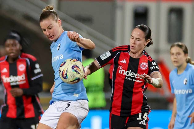 Julia Stierli SC Freiburg and Geraldine Reuteler Eintracht Frankfurt battle for the ball, Google Pixel Frauen Bundesliga, Eintracht Frankfurt v SC Freiburg, Stadion am Brentanobad, February 23, 2026 in Frankfurt, Germany Photo by Marco Steinbrenner DeFodi Images Julia Stierli SC Freiburg and Geraldine Reuteler Eintracht Frankfurt battle for the ball, Google Pixel Womens Bundesliga, Eintracht Frankfurt v SC Freiburg, Stadion am Brentanobad, February 23, 2026 in Frankfurt, Germany Photo by Marco Steinbrenner DeFodi Images DFB DFL REGULATIONS PROHIBIT ANY USE OF PHOTOGRAPHS AS IMAGE SEQUENCES AND OR QUASI VIDEO