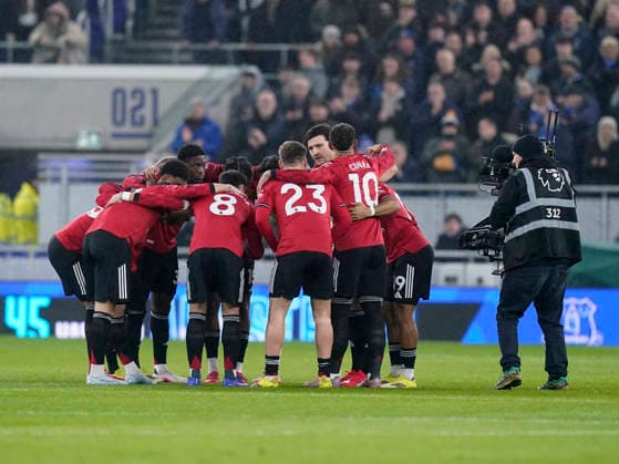 Liverpool, England, 23rd February 2026. Manchester United, ManU huddle during the Everton vs Manchester United Premier League match at Hill Dickinson Stadium, Liverpool. Picture credit should read: Andrew Yates Sportimage EDITORIAL USE ONLY. No use with unauthorised audio, video, data, fixture lists, club league logos or live services. Online in-match use limited to 120 images, no video emulation. No use in betting, games or single club league player publications. SPI_014_AY_Everton_Man_Utd SPI-4547-0014