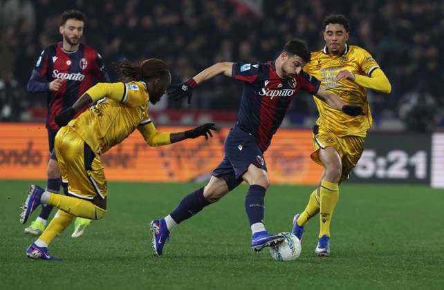Bologna™s Riccardo Orsolini fight for the ball with Udinese™s Jordan Zemura during the Serie A soccer match between Bologna and Udinese at the Renato Dall™Ara Stadium in Bologna -Monday, February 23, 2026. - Soccer .  Copyright: xGiannixSantandrea LaPressex