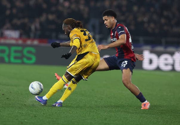 Udinese™s Jordan Zemura fight for the ball with Bologna™s Simon Sohm during the Serie A soccer match between Bologna and Udinese at the Renato Dall™Ara Stadium in Bologna -Monday, February 23, 2026. - Soccer .  Copyright: xGiannixSantandrea LaPressex