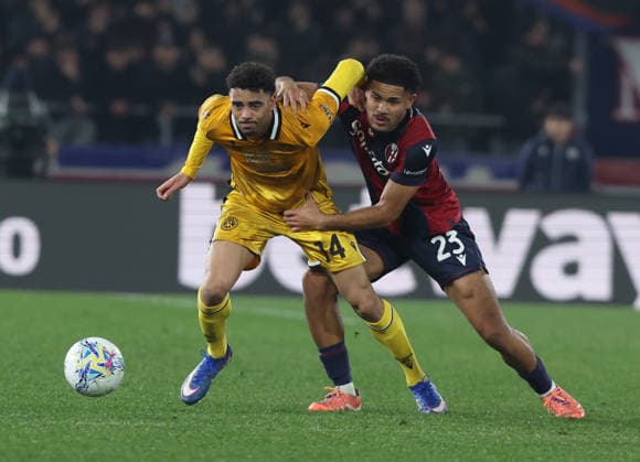 Udinese™s Arthur Atta fight for the ball with Bologna™s Simon Sohm during the Serie A soccer match between Bologna and Udinese at the Renato Dall™Ara Stadium in Bologna -Monday, February 23, 2026. - Soccer .  Copyright: xGiannixSantandrea LaPressex