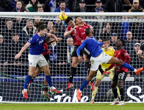 Liverpool, England, 23rd February 2026. Harry Maguire of Manchester United, ManU and Casemiro of Manchester United combine to keep Everton pout during the Everton vs Manchester United Premier League match at Hill Dickinson Stadium, Liverpool. Picture credit should read: Andrew Yates Sportimage. EDITORIAL USE ONLY. No use with unauthorised audio, video, data, fixture lists, club league logos or live services. Online in-match use limited to 120 images, no video emulation. No use in betting, games or single club league player publications. SPI_067_AY_Everton_Man_Utd SPI-4547-0067