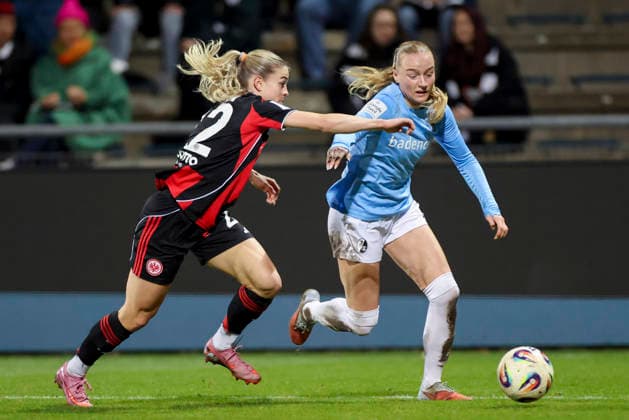 Nadine Riesen Eintracht Frankfurt and Tessa Blumenberg SC Freiburg battle for the ball, Google Pixel Frauen Bundesliga, Eintracht Frankfurt v SC Freiburg, Stadion am Brentanobad, February 23, 2026 in Frankfurt, Germany Photo by Marco Steinbrenner DeFodi Images Nadine Riesen Eintracht Frankfurt and Tessa Blumenberg SC Freiburg battle for the ball, Google Pixel Womens Bundesliga, Eintracht Frankfurt v SC Freiburg, Stadion am Brentanobad, February 23, 2026 in Frankfurt, Germany Photo by Marco Steinbrenner DeFodi Images DFB DFL REGULATIONS PROHIBIT ANY USE OF PHOTOGRAPHS AS IMAGE SEQUENCES AND OR QUASI VIDEO