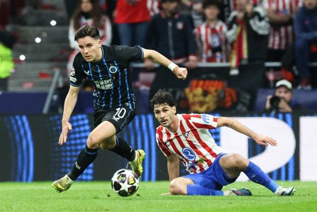 Club s Hugo Vetlesen and Atletico Madrid s Johnny Cardoso fight for the ball during a soccer game between Spanish team Atletico Madrid and Belgian Club Brugge, in Madrid, on Tuesday 24 February 2026, the return leg game in the Knockout phase play-offs of the UEFA Champions League tournament. BRUNOxFAHY  x164862652x