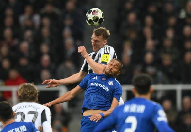 Dan Burn for Newcastle United vies for the ball with Dani Bolt of Qarabag Newcastle United v Qarabag, UEFA Champions League, Knockout Round Play-Offs, Second Leg, Football, St James Park, Newcastle, UK - 24 Feb 2026Newcastle St James Park Azerbaijan EDITORIAL USE ONLY No use with unauthorised audio, video, data, fixture lists, club league logos or live services. Online in-match use limited to 120 images, no video emulation. No use in betting, games or single club league player publications.  Copyright: xRichardxLee Shutterstockx 16693044aw