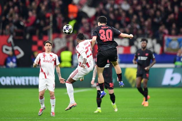 Bayer 04 Leverkusen v Olympiacos - UEFA Champions League LEVERKUSEN, GERMANY - FEBRUARY 24: Ibrahim Maza (30) of Bayer 04 Leverkusen in action against Rodinei (23) of Olympiacos during the UEFA Champions League play-off match between Bayer 04 Leverkusen and Olympiacos at BayArena in Leverkusen, Germany, on February 24, 2026. Hesham Elsherif Anadolu Leverkusen Germany. Editorial use only. Please get in touch for any other usage.  Copyright: x2026xAnadoluxHeshamxElsherifx