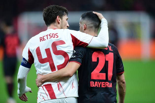 Bayer 04 Leverkusen v Olympiacos - UEFA Champions League LEVERKUSEN, GERMANY - FEBRUARY 24: Lucas Vazquez (21) of Bayer 04 Leverkusen and Panagiotis Retsos (45) of Olympiacos are seen during the UEFA Champions League play-off match between Bayer 04 Leverkusen and Olympiacos at BayArena in Leverkusen, Germany, on February 24, 2026. Hesham Elsherif Anadolu Leverkusen Germany. Editorial use only. Please get in touch for any other usage.  Copyright: x2026xAnadoluxHeshamxElsherifx