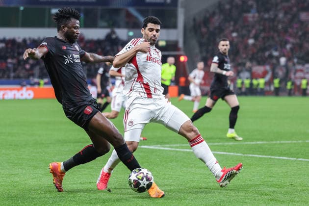 Soccer Champions League Play off second leg Bayer 04 Leverkusen Olympiakos Piraeus on 24 02 2026 at the BayArena in Leverkusen Edmond Tapsoba Leverkusen , left Mehdi Taremi Piraeus , right xJRx