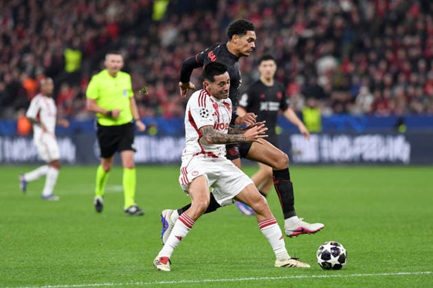 Francisco Ortega Olympiakos FC and Jarell Quansah Bayer 04 Leverkusen in a duel during the UEFA Champions League 2025 26, Play offs, second leg match between Bayer 04 Leverkusen and Olympiakos Piraeus, BayArena on February 24, 2026 in Leverkusen, Germany, Germany Photo by Ralf Treese DeFodi Images Francisco Ortega Olympiakos FC and Jarell Quansah Bayer 04 Leverkusen battle for the ball during the UEFA Champions League 2025 26 League Knockout Play off Second Leg match between Bayer 04 Leverkusen and Olympiacos FC at BayArena on February 24, 2026 in Leverkusen, Germany Photo by Ralf Treese DeFodi Images