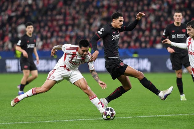 Francisco Ortega Olympiakos FC and Jarell Quansah Bayer 04 Leverkusen in a duel during the UEFA Champions League 2025 26, Play offs, second leg match between Bayer 04 Leverkusen and Olympiakos Piraeus, BayArena on February 24, 2026 in Leverkusen, Germany, Germany Photo by Ralf Treese DeFodi Images Francisco Ortega Olympiakos FC and Jarell Quansah Bayer 04 Leverkusen battle for the ball during the UEFA Champions League 2025 26 League Knockout Play off Second Leg match between Bayer 04 Leverkusen and Olympiacos FC at BayArena on February 24, 2026 in Leverkusen, Germany Photo by Ralf Treese DeFodi Images