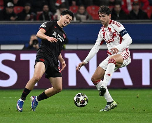28 01 2025, xophax, Football , UEFA Champions League , 2025 2026 , Bayer Leverkusen vs Olympiakos Piraeus Ibrahim Maza , left Bayer 04 Leverkusen and Panagiotis Retsos, right Piraeus Leverkusen