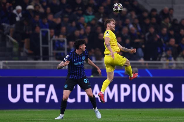 Ole Didrik Blomberg (FK Bodo Glimt) und Alessandro Bastoni (Fc Internazionale) battle for the ball, UEFA Champions League 2025 26 League Play-off second leg, FC Internazionale Milano v FK Bodo Glimt, Stadio Giuseppe Meazza (San Siro), February 24, 2026, Milan, Italy.