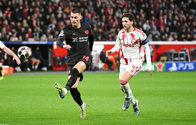 Football, Champions League, Germany, Men, Season 2025 2026, Play offs, BayArena Leverkusen Bayer Leverkusen Olympiakos Piraeus Patrik Schick LEV , Panagiotis Retsos OLP Action