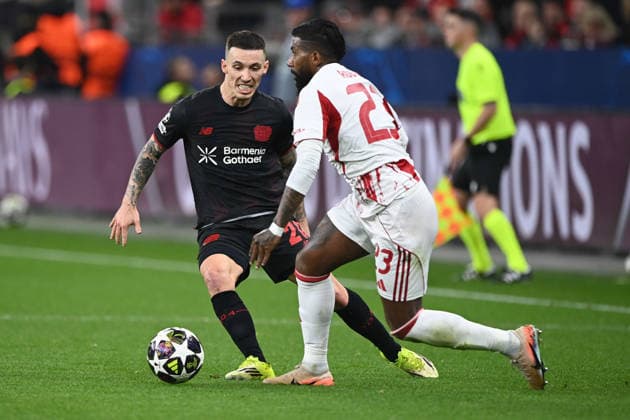 Alejandro GRIMALDO LEV vs RODINEI PI aaz Football Champions League, Play Offs, Bayer 04 Leverkusen LEV Olympiakos Piraeus PI on 24 02 2026 in Leverkusen Germany UEFA regulations prohibit any use of photographs as image sequences and or quasi video Â